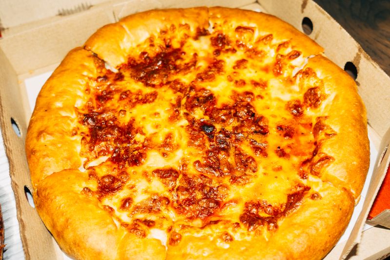 Four Cheese luxury pizza at Marcos